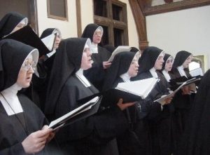Nuns in traditional habit singing