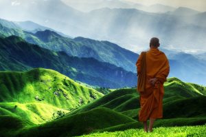 Buddhist monk on mountaintop